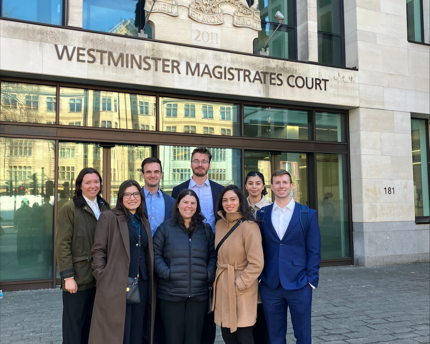 Students standing in front of Westminster Magistrates Court