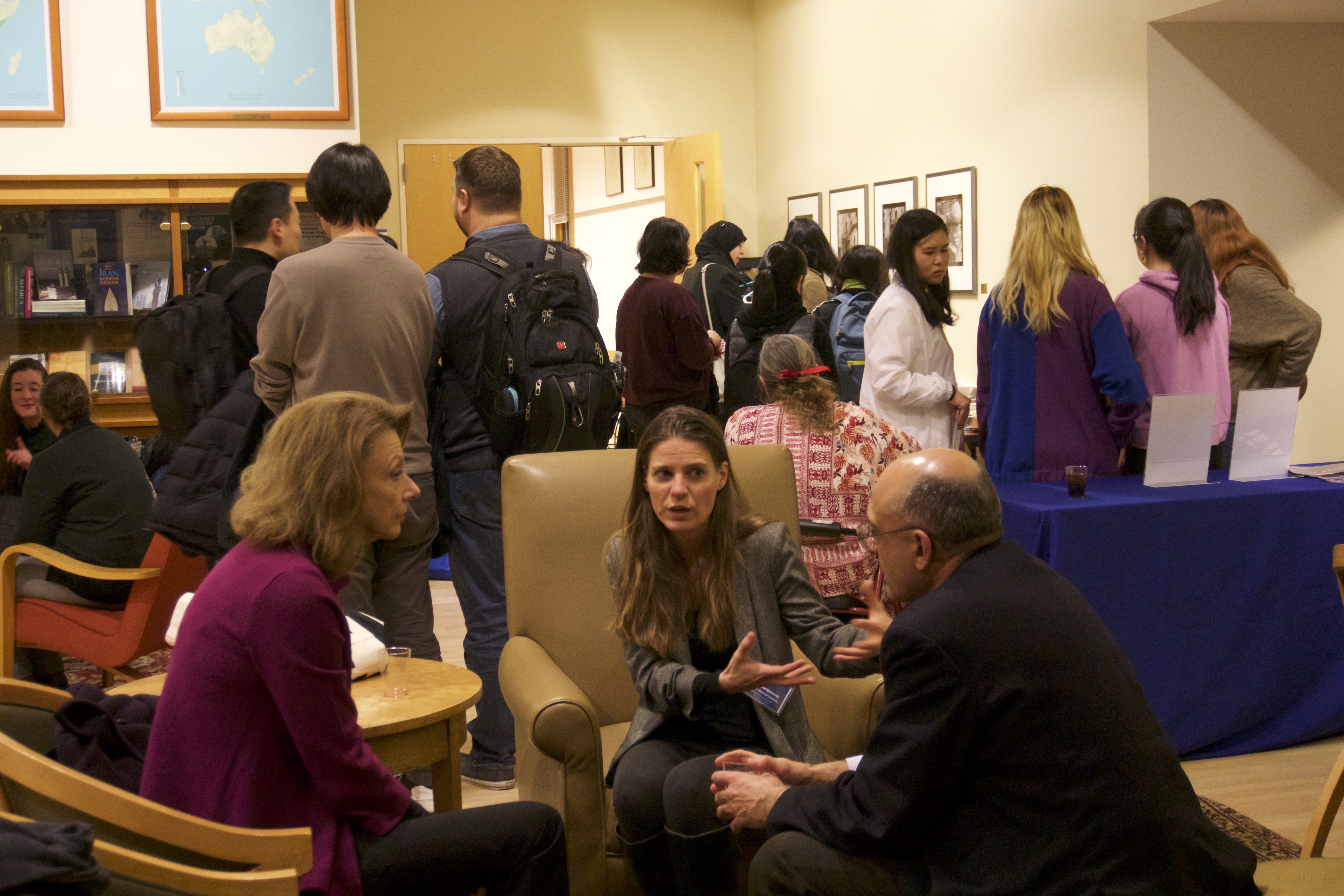 Ambassador Milica Pejanović-Djurišić speaks with conference participants at the reception after her keynote remarks.