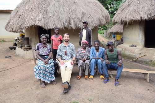 Ethan Timmins-Schiffman with some residents of Gbangbadou, one of the larger towns on the road between Kankan and Kissidougou.  Moustapha Camara, resident of Gbangbadou and Ethan's guide/translator there, suggested interviewing this particular family because the oldest generation could speak to how life in the town changed as a result of the road's construction in the 70s and 80s. 