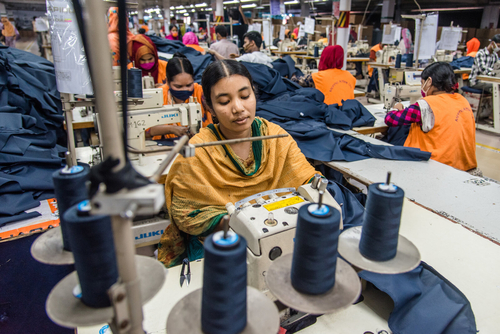 Women manufacture clothes in Dhaka, Bangladesh on Aug. 29. The ready-made garment (RMG) industry in Bangladesh is now a mainstay of the country's economy. Today, Bangladesh is one of the world's largest garment exporters, with the sector accounting for more than 80% percent of Bangladesh's exports. Mustasinur Rahman Alvi/Eyepix Group/Future Publishing/Getty Images