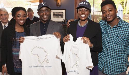 Strive and Tsitsi Masiyiwa (center) were officially welcomed into the YYAS family with gifts given by current YYAS instructors Yaa Ampofo ’16 and Roy Randen ’18.