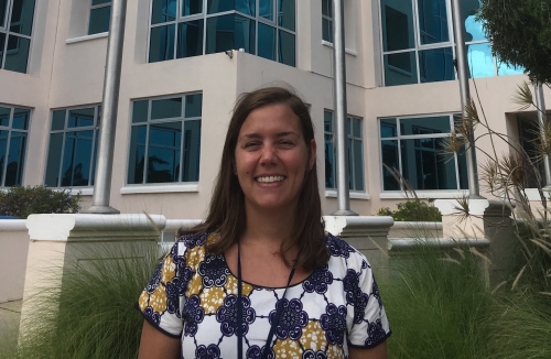 Brittany Williams in front of the UN House in Barbados.