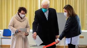 Winfried Kretschmann, leader of the Greens and Minister-President of Baden-Württemberg, and Mrs. Kretschmann voting in the state election Sunday.