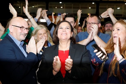 Mary Lou McDonald, the leader of Sinn Féin, celebrating the party’s vote at the counting center Sunday evening.
