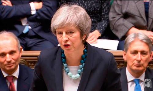 British Prime Minister Theresa May informing the House of Commons Monday that the vote on the EU-UK withdrawal agreement was being deferred.
