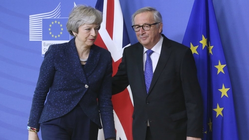 British Prime Minister Theresa May and European Commission President Jean-Claude Juncker in Brussels, Feb. 7, after agreeing to reopen talks on the political declaration on the future relationship.