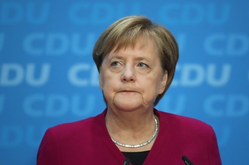German Chancellor Angela Merkel telling CDU Bundestag members crisis over Constitutional Court ruling ‘solvable’, May 11.