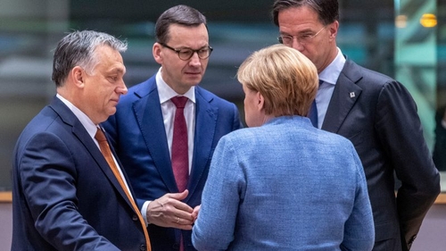 Hungarian Prime Minister Viktor Orbán, Polish Prime Minister Mateusz Morawiecki and Dutch Prime Minister Mark Rutte speaking with German Chancellor Angela Merkel at yesterday’s European Council meeting.