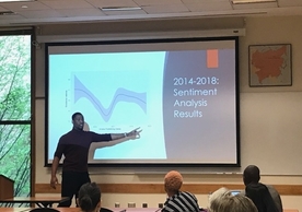 Yale College Senior Ademide Ajayi discussing "Natural Language Processing," a subfield of computer science, as a way to understand public opinion about the Nigerian president.