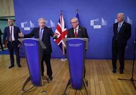 British Prime Minister Boris Johnson and European Commission President Jean-Claude Juncker announcing agreement yesterday.