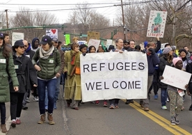 Marchers at the 2017 Refugee Run, organized by Integrated Refugee and Immigrant Services (IRIS), walking from East Rock to Downtown New Haven. The march concluded in speeches from city officials, refugees, and others to show support for the resettled members of the community.