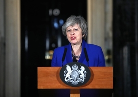 Prime Minister Theresa May speaking outside 10 Downing Street Wednesday evening after the vote of no confidence was rejected.