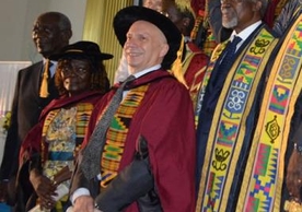 Photo caption: front row, third from left, Ian Shapiro; behind him is Kofi Annan; Christopher Udry is in the back row, upper left corner.