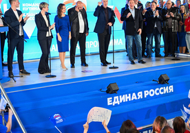 United Russia party leaders celebrating Sunday evening after the Duma election.