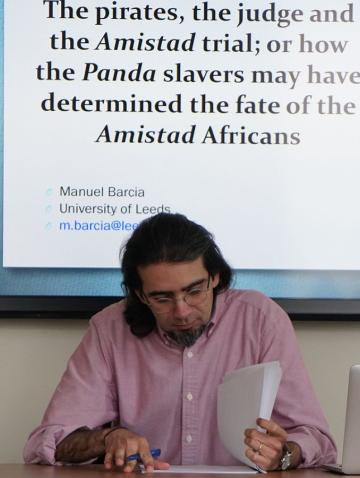 Manuel Barcia preparing to give a talk 