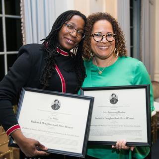 Winners Tiya Miles and Erica Armstrong Dunbar with their awards