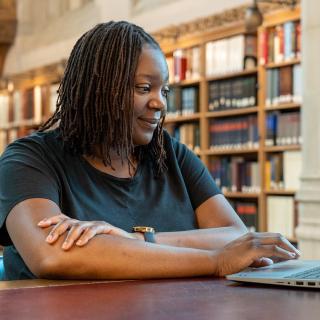 GLC Fellow Shantel George at Sterling Memorial Library 