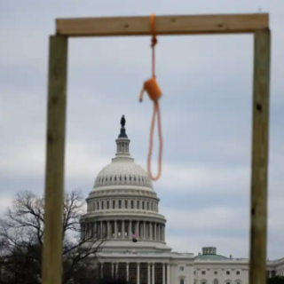 Supporters of Donald Trump displayed a gallows as they gathered outside the US Capitol on 6 January 2021. Photograph: Andrew Caballero-Reynolds/AFP/Getty Images