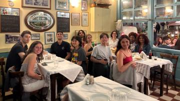 Students having dinner at a local tavern