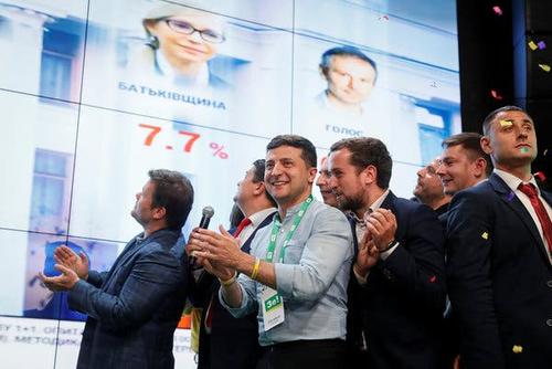 Ukraine President Volodymyr Zelensky cheering the exit polls Sunday evening. Ukraine President Volodymyr Zelensky cheering the exit polls Sunday evening.